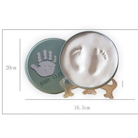 https://ae01.alicdn.com/kf/H3e18b971d0da49deb9b11810f9d5d06a2/Newborn-Baby-Hand-Foot-Print-Hands-Feet-Baby-Photo-Frame-DIY-Handprint-With-Cover-Fingerprint-Mud.jpg