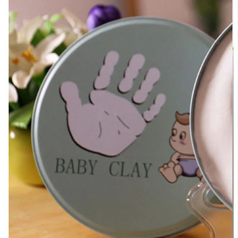 https://ae01.alicdn.com/kf/Hdbb38b63e6ef4dddae87dfeedec62bda3/Newborn-Baby-Hand-Foot-Print-Hands-Feet-Baby-Photo-Frame-DIY-Handprint-With-Cover-Fingerprint-Mud.jpg
