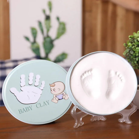 https://ae01.alicdn.com/kf/H23789e61563f44dda36048610a891529t/Newborn-Baby-Hand-Foot-Print-Hands-Feet-Baby-Photo-Frame-DIY-Handprint-With-Cover-Fingerprint-Mud.jpg