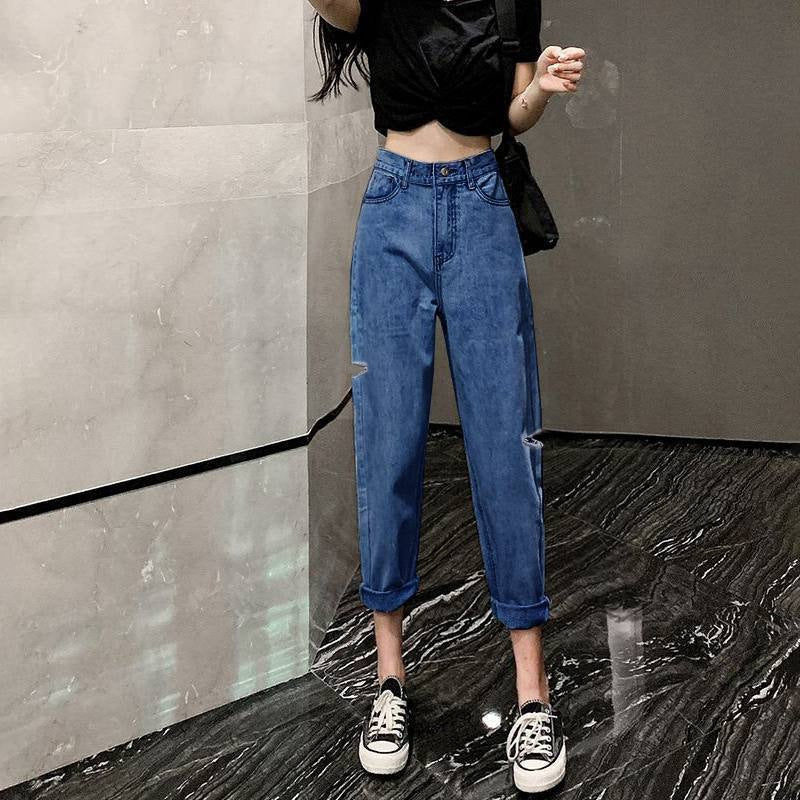 Jeans rectos de tubo con nueve aberturas y rotos