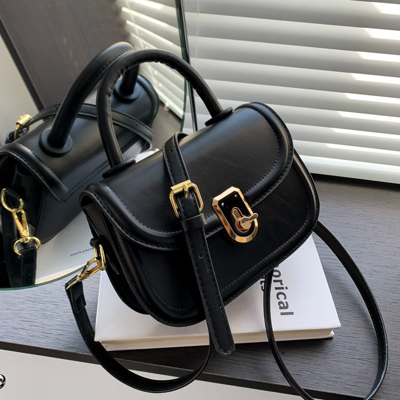 Bolsa Flap Riley con Solapa Elegante