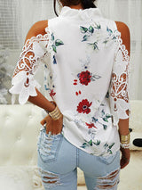 Elegante blusa con estampado floral y escote en pico