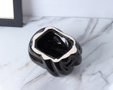 Caja de pañuelos de cerámica con nudo