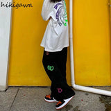https://ae01.alicdn.com/kf/S1e9e6d76fb0b422d8f395a40afddc5041/Sokak-sokak-kad-n-giyim-2023-yeni-dipleri-bask-Hip-hop-geni-bacak-pantolon-rahat-moda.jpg