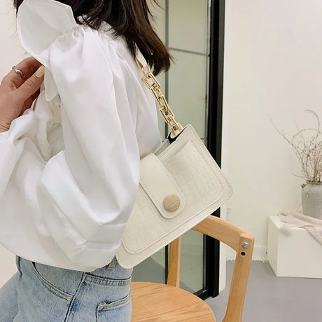 https://ae01.alicdn.com/kf/S01e4d23b26af4b4887c4ed87e69d1eeb3/Stone-Pattern-Wide-Shoulder-Strap-Small-Square-Bag-Retro-Fashion-Pu-Leather-Shoulder-Handbags-New-Underarm.jpg
