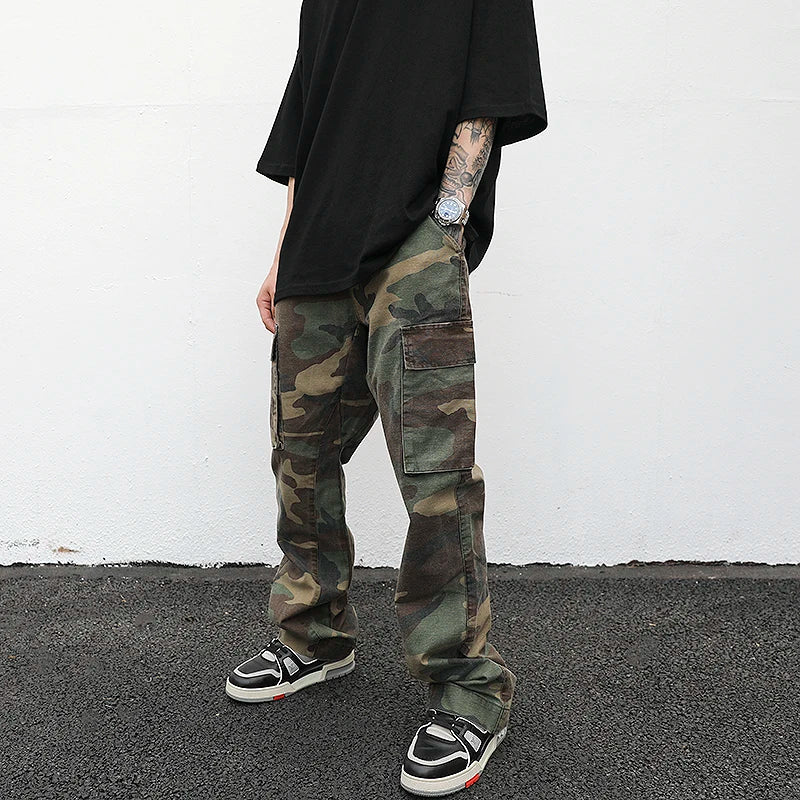 https://ae01.alicdn.com/kf/H9e19a223c4ee4b1ca133e449a78193bfG/Streetwear-Mens-Hip-Hop-Camouflage-Flare-Pants-Fashionable-Camo-Cargo-Pants-Male-Slim-Fit-Camouflage-Trousers.jpg