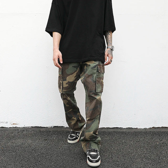 https://ae01.alicdn.com/kf/H3a8a94d40d2e4f1bbaf56eb426c19f52r/Streetwear-Mens-Hip-Hop-Camouflage-Flare-Pants-Fashionable-Camo-Cargo-Pants-Male-Slim-Fit-Camouflage-Trousers.jpg