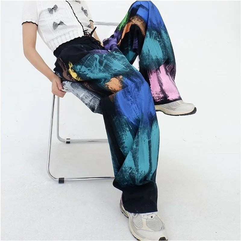https://ae01.alicdn.com/kf/S19a586c51272476d8251869d6af4adccU/Streetwear-Y2K-Graffiti-Color-Woman-Oversize-Pants-Spring-Summer-Pockets-Elastic-Waist-Hip-Hop-Sports-Casual.jpg