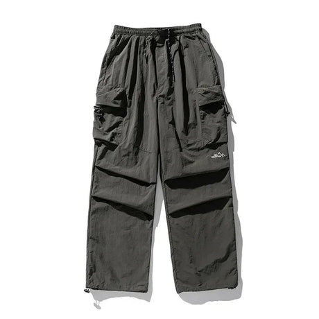 https://ae01.alicdn.com/kf/Sa4d2f86dcdc948ffbdc293dc1f9e395cm/TINT-ERA-Parachute-Cargo-Pants-Men-Oversize-Outdoor-Casual-Trousers-Male-Waterproof-Pants-Man-Japanese-Streetwear.jpg_640x640.jpg