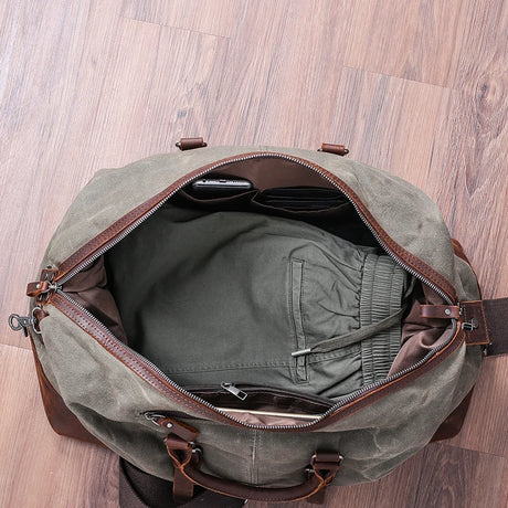 https://ae01.alicdn.com/kf/H368f3b18641149c986301e4040110300C/Wax-Canvas-Travel-Bag-Large-Capacity-Luggage-Bag-Waterproof-Duffel-Bag-Men-Hand-Suitcase-Weekend-Bag.jpg