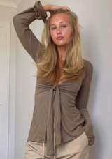 Set de manga larga con moño y tela suave