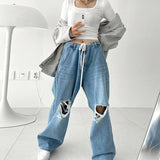 Pantalones holgados de cintura alta con lazo y rotos irregulares de hip hop para mujer