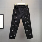 Pantalones de chimenea holgados y finos con agujeros y diseño de estrellas para hombre